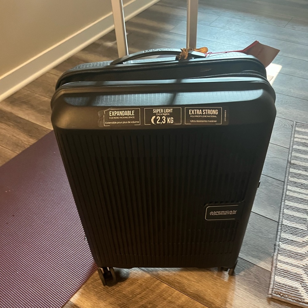 Brand new American Tourister Carry on suitcase